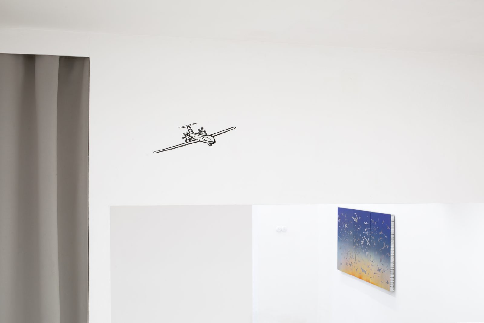 Asymmetric Futures, installation view with a drone drawn directly on the gallery wall above an An Ideal Sky painting