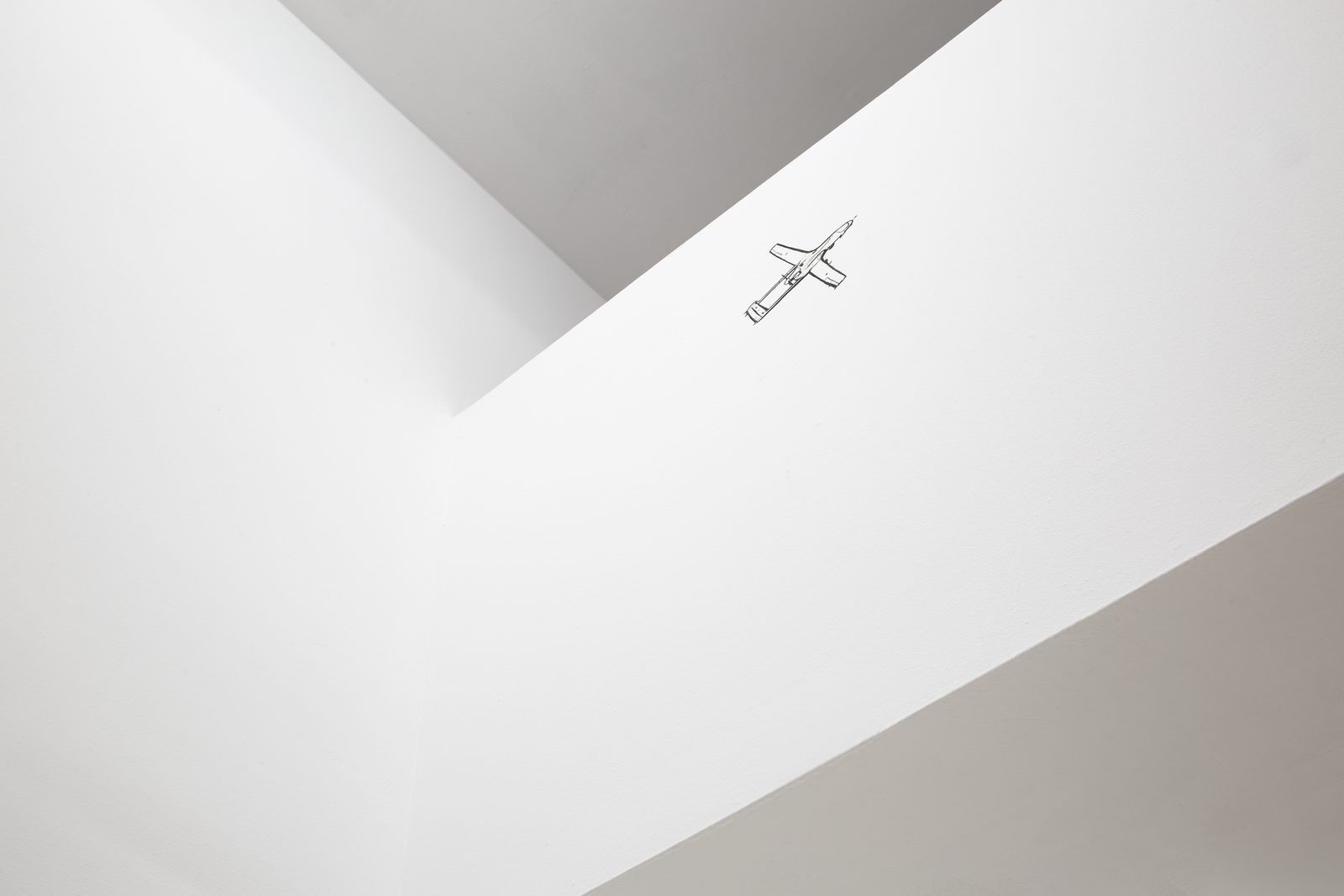 Joan Palle, drone drawn directly on the gallery wall below the ceiling