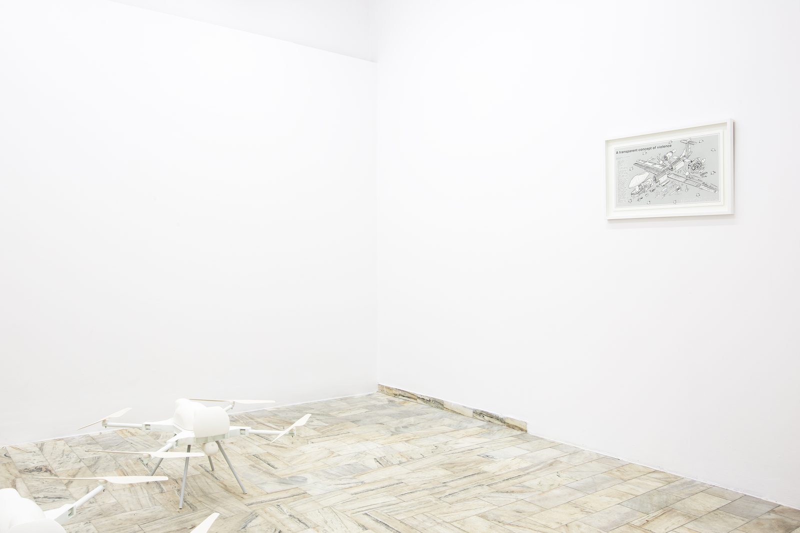 Asymmetric Futures, installation view with the SWARM drones on the floor and a framed Exploded Views drawing
